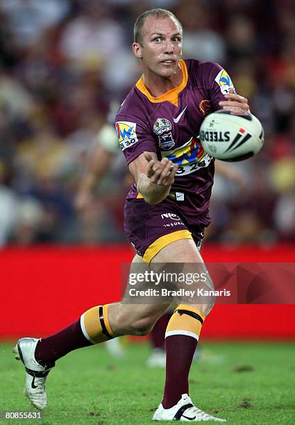 Darren Lockyer of the Broncos passes the ball during the round seven NRL match between the Brisbane Broncos and the South Sydney Rabbitohs at Suncorp...