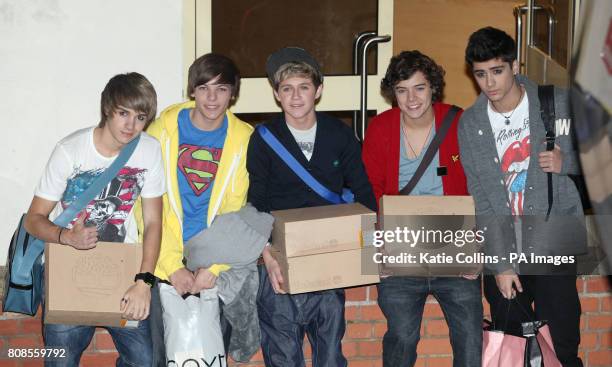 Liam Payne, Louis Tomlinson, Niall Horan, Harry Styles and Zayn Malik of One Direction leave after this week's X Factor result show, at the Fountain...