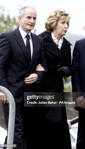 President Mary McAleese with her husband Martin at the funeral mass of his seven-year-old daughter Leana Martin at The Church of Our Lady of Lourdes,...