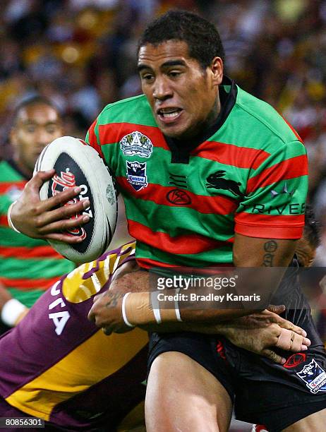 Fetuli Talanoa of the Rabbitohs takes on the Broncos defence during the round seven NRL match between the Brisbane Broncos and the South Sydney...