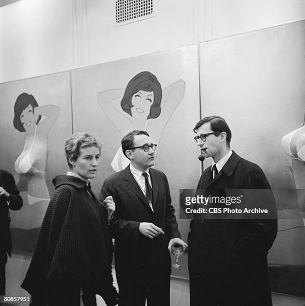 On an episode of the television documentary news program 'Eye on New York,' American sculptor George Segal talks with unidentified others at the...