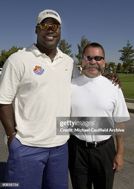 Kevin Carter of the Tennessee Titans with Academy of Country Music President, David Corlew