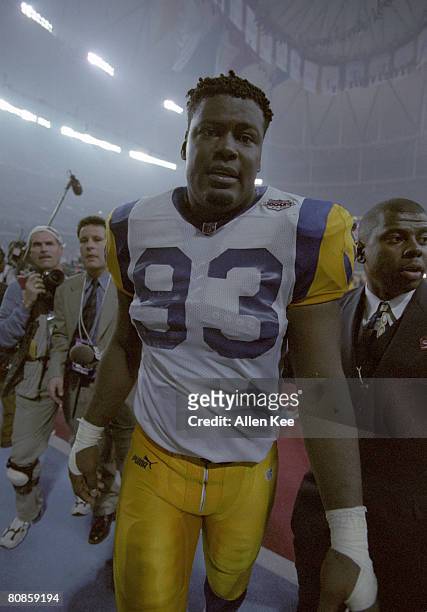 St. Louis Rams defensive end Kevin Carter leaves the field following the Rams 23-16 victory over the Tennessee Titans in Super Bowl XXXIV on January...