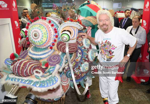 Sir Richard Branson launches Virgin Australia's inaugural Melbourne to Hong flights by carrying the head of 32-metre local Bendigo dragon, Yar Loong...