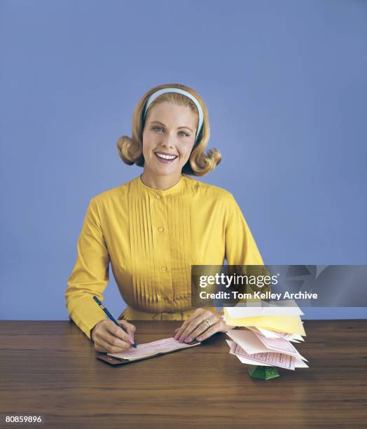 Woman Writecheck 248 Woman Writing A Check Stock Photos, High-Res Pictures, and Images ...