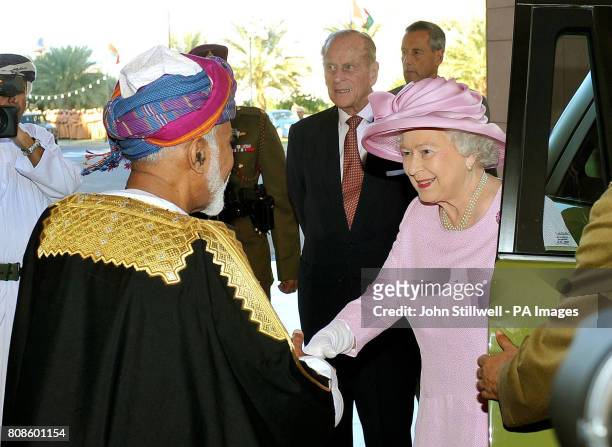 Queen Elizabeth II is greeted by the Sultan of Oman, His Majesty Sultan Qaboos bin Said, as the Queen and the Duke of Edinburgh arrive for the...