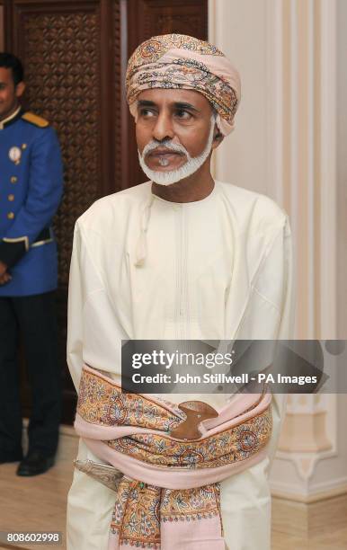 The Sultan of Oman, His Majesty Sultan Qaboos bin Said, waits to wave goodbye to Queen Elizabeth II and Duke of Edinburgh, after watching an...