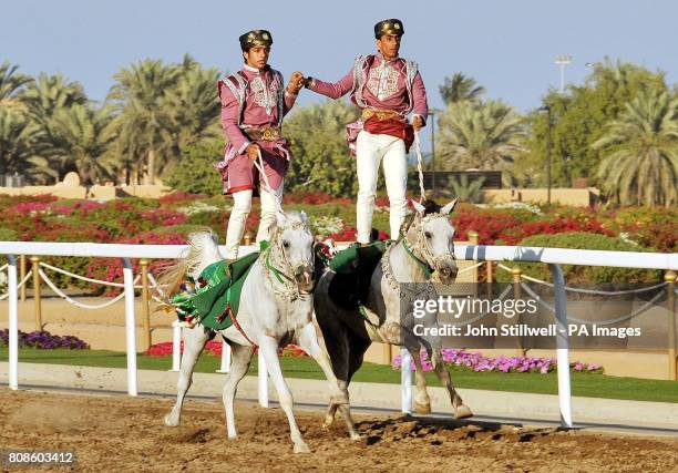 Participants in the Equestrian and Horse Racing show, that performed for Queen Elizabeth II and Duke of Edinburgh, in the presence of the Sultan of...