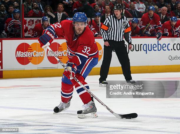 Mark Streit of the Montreal Canadiens passes the puck against the Boston Bruins during game seven of the 2008 NHL conference quarter-final series at...