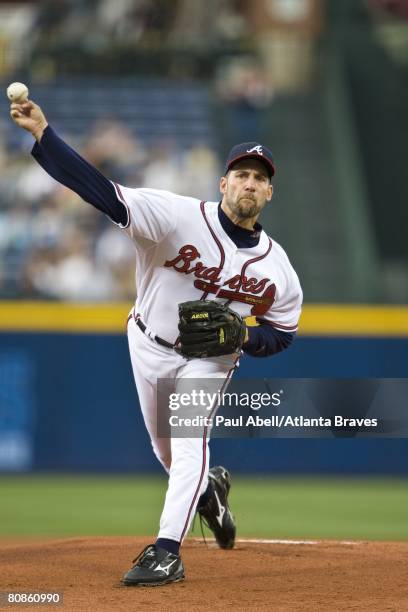 Pitcher John Smoltz of the Atlanta Braves pitches during the first inning against the Washington Nationals at Turner Field in Atlanta Georgia on...