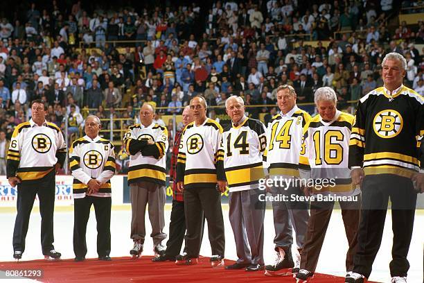 Former Boston Bruins alumni stand at center ice during "Last Hurrah" ceremony celebrating the closing of Boston Garden on September 28,1995.