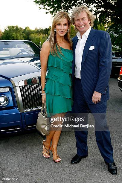 Alicia Jacobs and producer of American Idol Nigel Lythgoe arrive at the BritWeek Champagne Launch on April 24, 2008 in Los Angeles, California.