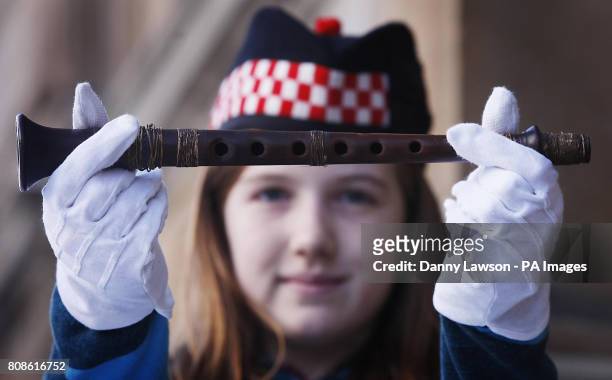 Grace Welden, distant relative of Iain Dall MacKay, holds the oldest known Highland bagpipe chanter at its new home in the National Piping Centre in...