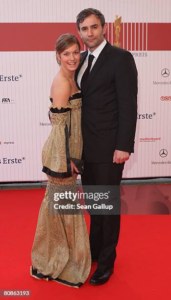 Actress Lisa Martinek and friend Giulio Ricciarelli attend the German Film Award 2008 at the Palais am Funkturm on April 25, 2008 in Berlin, Germany.