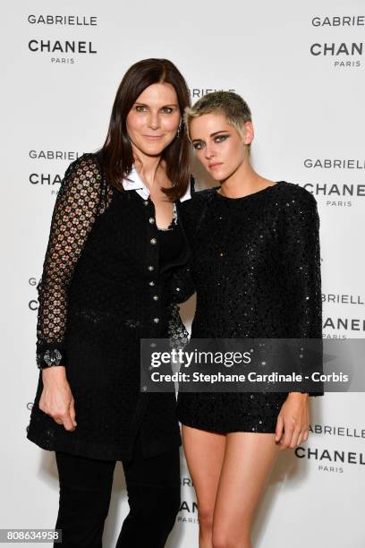 Julie Thomans and Kristen Stewart attend the launch party for Chanel's new perfume "Gabrielle" as part of Paris Fashion Week on July 4, 2017 in...