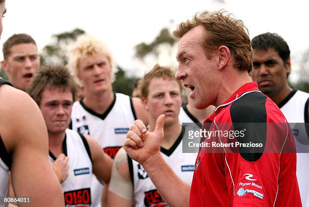 Bombers coach Adrian Hickmott gives instructions to his players during the round five VFL match between Sandringham and the Bendigo Bombers at Trevor...