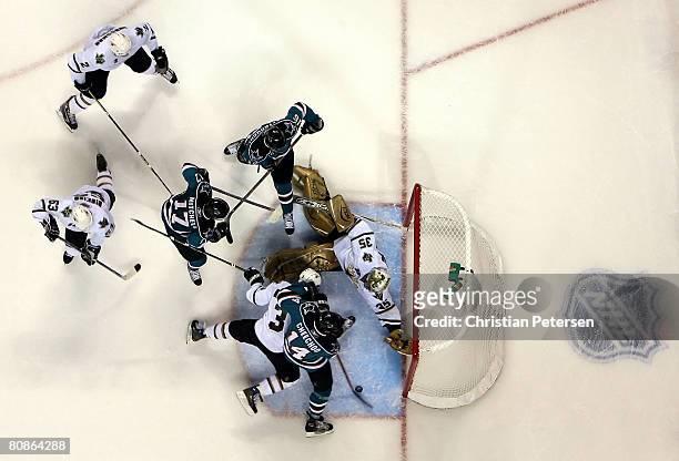 Jonathan Cheechoo of the San Jose Sharks scores the game tying goal past goaltender Marty Turco of the Dallas Stars late in the third period of game...