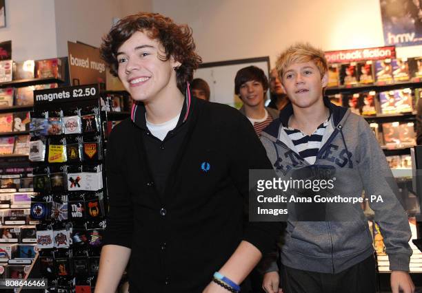 Factor's One Direction members Harry Styles and Niall Horan arrive for an autograph signing session at the HMV store, Bradford.