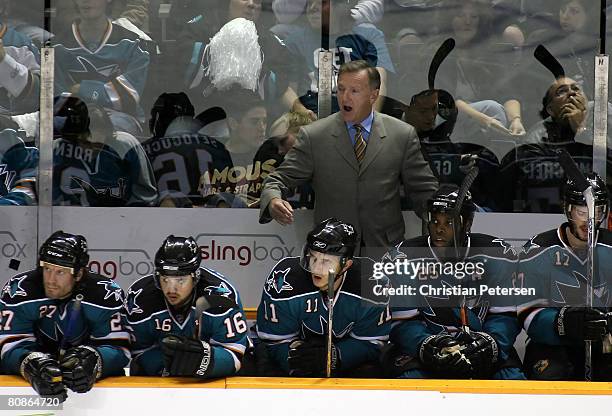 Head coach Ron Wilson of the San Jose Sharks directs his team against the Dallas Stars during game one of the Western Conference Semifinals of the...