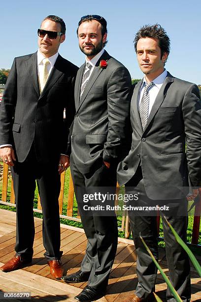 Callan Mulvey, Gryton Grantley and Damian Walshe-Howling from the television show 'Underbelly' pose at the David Jones Marque Emirates Doncaster Day...