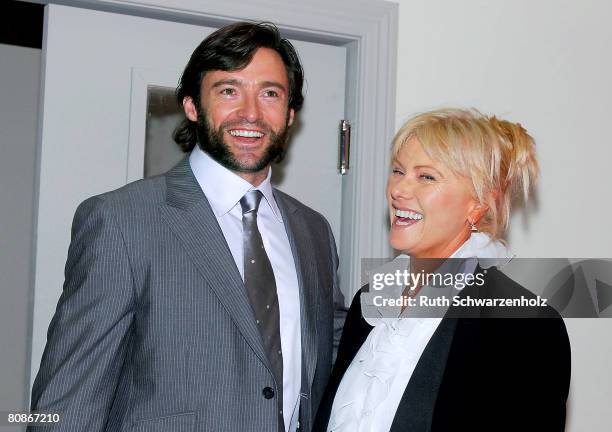 Actor Hugh Jackman and wife Deborra-Lee Furness pose at the Emirates Marquee on Emirates Doncaster Day at the Royal Randwick Racecourse on April 26,...