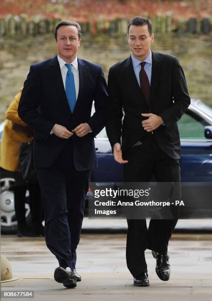 Prime Minister David Cameron meets Morrisons CEO Dalton Philips as he arrives for a PM Direct event at the Morrisons Headquarters in Bradford.