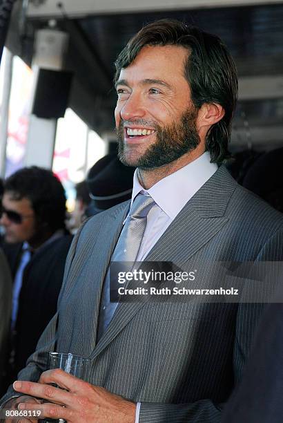 Actor Hugh Jackman watches the horse racing inside the David Jones Marquee on Emirates Doncaster Day at the Royal Randwick Racecourse on April 26,...