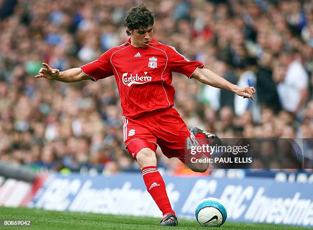 Liverpool's Argentinian defender Emiliano Insua in action against Birmingham City in their English Premier League football match at St Andrews in...