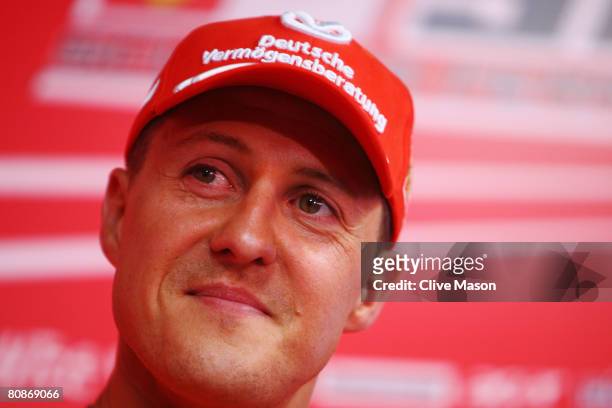 Former Ferrari F1 World Champion Michael Schumacher of Germany talks at a press conference following qualifying for the Spanish Formula One Grand...
