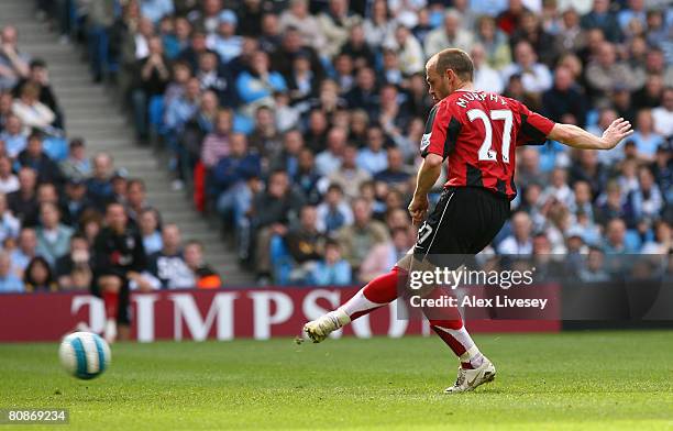 Danny Murphy of Fulham scores from the rebound from a penalty kick during the Barclays Premier League match between Manchester City and Fulham at the...