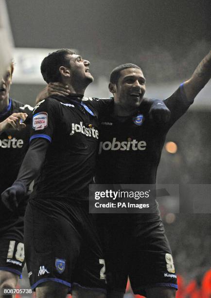 Portsmouth's Nadir Ciftci & Hayden Mullins celebrate after their side equalize after Leeds United's Andrew O'Brien scored and own goal during the...