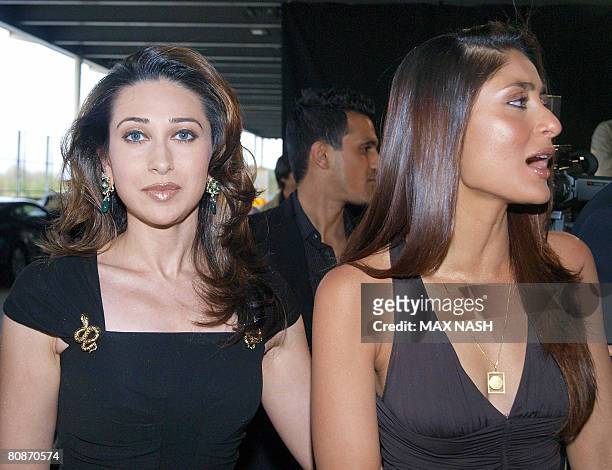 Indian actors Kareena Kapoor, , and Karishma Kapoor, , arrive for the Zee Cine film awards 2008, at the ExCel center in London, on April 26, 2008....