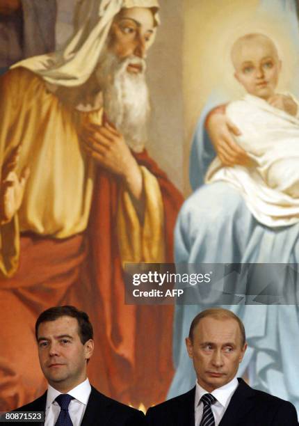 Russian President Vladimir Putin and President-elect Dmitry Medvedev attend the celebration of the Orthodox Easter in Christ the Savior cathedral in...