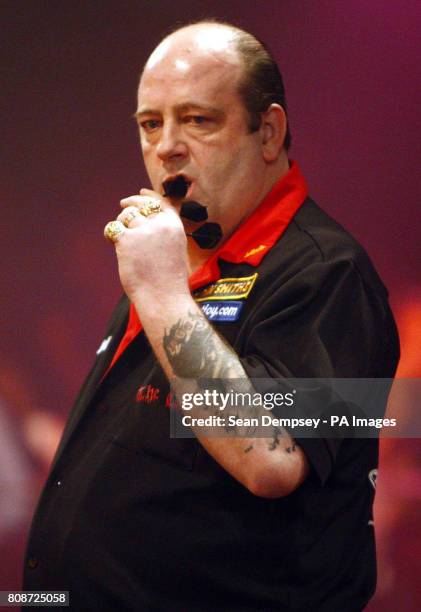 Ted Hankey in action against Scott Waites during the BDO World Professional Darts Championship at the Lakeside Complex, London.