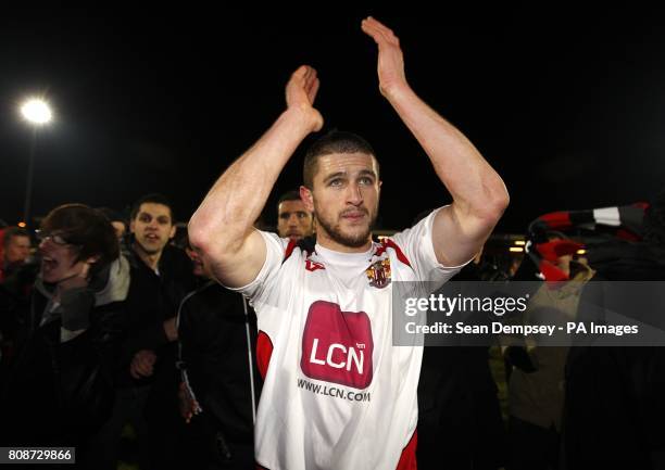 Stevenage's John Mousinho celebrates victory after the final whistle