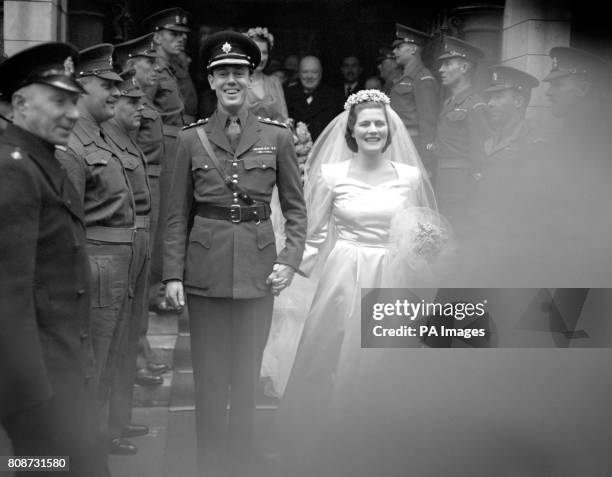 Mary Churchill, youngest daughter of Winston Churchill, after her wedding to Captain Christopher Soames at St Margaret's Church, Westminster, flanked...