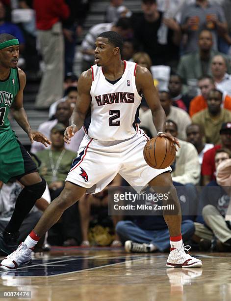 Guard Joe Johnson of the Atlanta Hawks dribbles towards the basket during Game Three of the Eastern Conference Quarterfinals against the Boston...