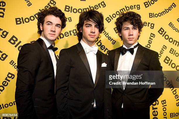 Musicians the Jonas Brothers arrive at the Bloomberg afterparty following the White House Correspondents' Dinner April 26, 2008 in Washington, DC.