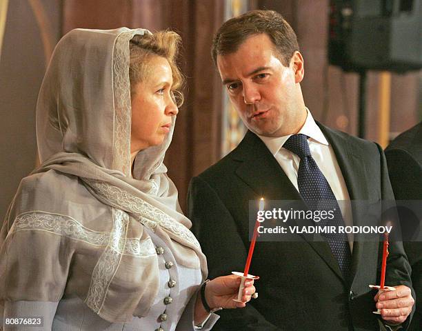 President elect Dmitry Medvedev , and his wife Svetlana attend the Easter service at the Christ the Savior cathedral in Moscow on April 27, 2008....
