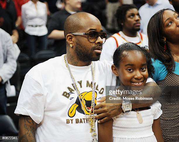 Producer/Rapper Jermaine Dupri and his Daughter attends the Boston Celtics vs Atlanta Hawks Playoff Game on April 26, 2008 in Atlanta.