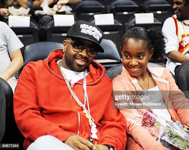 Producer/Rapper Jermaine Dupri and his Daughter attends the Boston Celtics vs Atlanta Hawks Playoff Game on April 26, 2008 in Atlanta.