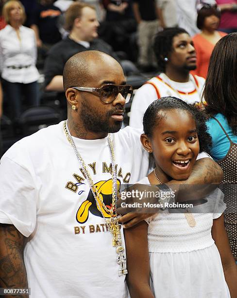 Producer/Rapper Jermaine Dupri and his Daughter attends the Boston Celtics vs Atlanta Hawks Playoff Game on April 26, 2008 in Atlanta.