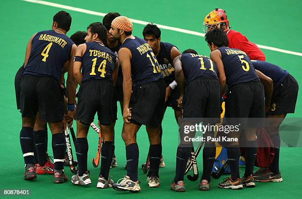 Raghunath,Tushar Khandekar and Prabhjot Singh of India look on from the team huddle during the 2008 Men`s Four Nations Tournament third place playoff...