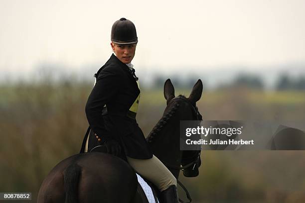 Zara Phillips warms her horse Tallyho Sambucca up before taking part in the Dressage section at Withington Manor Horse Trials at the Withington...
