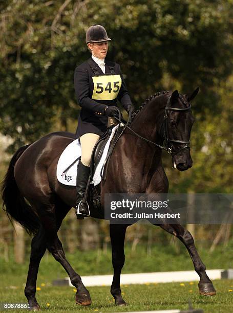 Zara Phillips warms her horse Tallyho Sambucca up before taking part in the Dressage section at Withington Manor Horse Trials at the Withington...