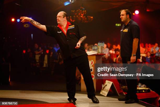 Ted Hankey in action against Scott Waites during the BDO World Professional Darts Championship at the Lakeside Complex, London.