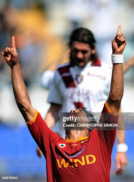 Roma's Brazilian Amantino Mancini jubilates as he scores the third goal during AS Roma vs Torino Italian Serie A football match at Olympic Stadium in...