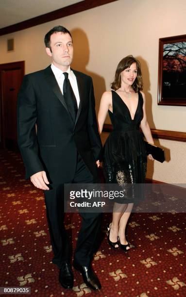 Actor Ben Affleck and his wife actress Jennifer Garner arrive 30 minutes late at the White House Correspondents' Association dinner on April 26, 2008...