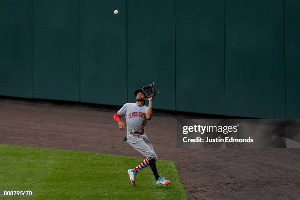 Center fielder Billy Hamilton of the Cincinnati Reds makes a catch on the warning track for the first out of the fourth inning during the game...