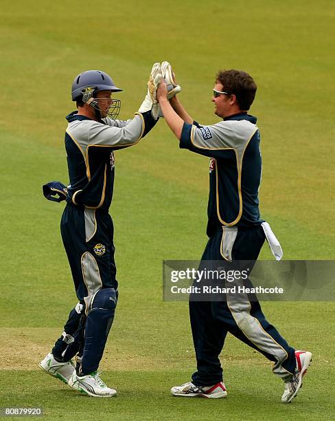 Geraint Jones of Kent celebrates with Robert Key as they combine to run out Billy Godleman during the Friends Provident Trophy match between...